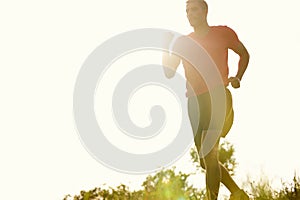 Man, outdoors and trail running with athlete for training with endurance for physical fitness. Male person, cross