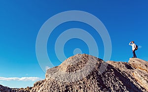 Man overlooking the mountains belown