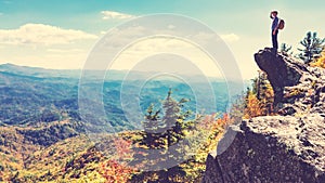 Man overlooking the mountains belown