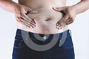 Man with overweight big fat belly chubby photo