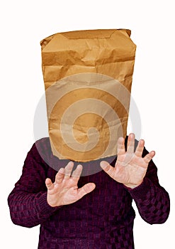 Man with a package on his head on a white  background. The man looking by feel road