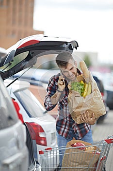 Man Packing Groceries