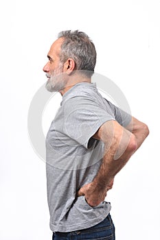 Man with pain in the back on white background