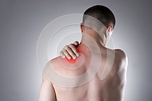 Man with pain in shoulder. Pain in the human body