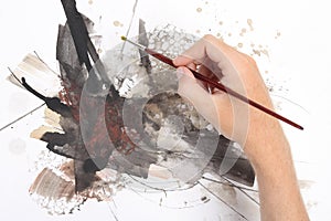Man painting abstract picrure