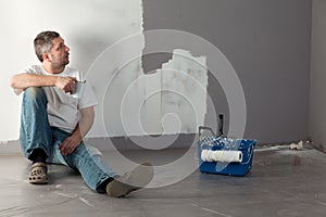 Man painting a wall.