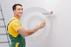The man painting the wall in diy concept