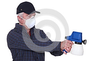 Man with a paintsprayer