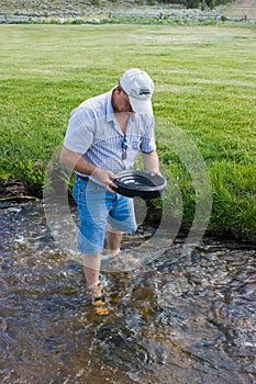 Man Panning For Gold photo