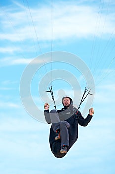 Man, parachute and paragliding in air nature for exercise, healthy adventure with extreme sport. Athlete, glide or