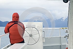 Man in parka on Alaskan Boat