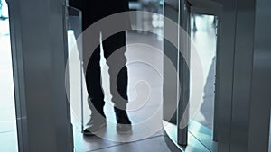 Man passing through the security gates. Media. Man using turnstile to enter the shopping center or subway.