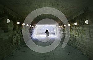 Man passing through underpass