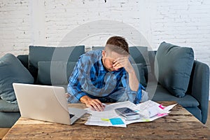 Man paying bills managing finances