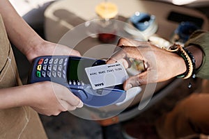 Man paying for lunch with credit card