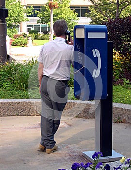 Man on payphone