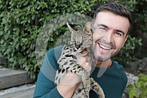 Man with pedigreed Savannah cat