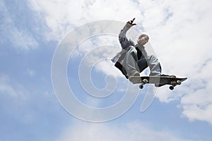 Man Performing Trick On Skateboard