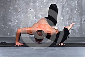 Man performing a yoga pose