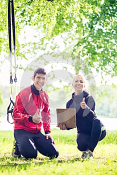 Man with personal trainer at debriefing