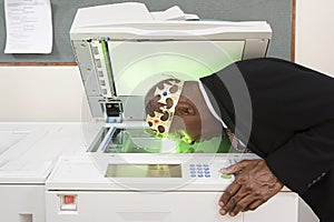 Man photocopying face