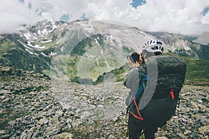 Man photographer taking photos of mountains landscape Travel Lifestyle