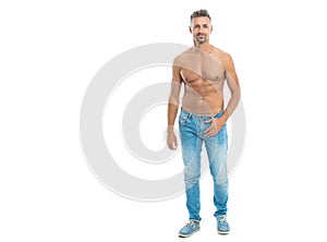 A man with physique poses shirtless showing muscular torso, copy space banner. muscular man with torso isolated on white