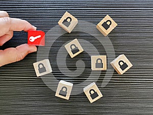 Man pick key icon among lock icons. Business strategy and plan concept.