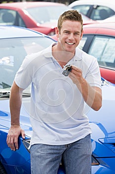 Man picking up new car