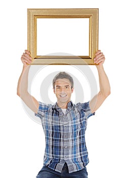 Man with picture frame.