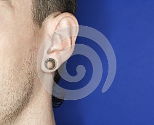 Man with pierced ear.