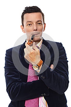Man with pink tie smoking pipe.