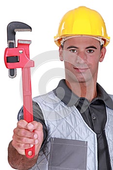 Man with a pipe wrench