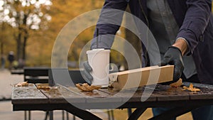 A man placing fast food on the table