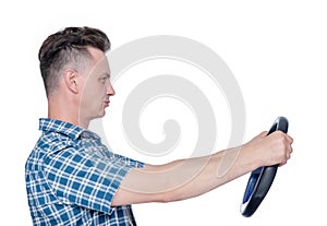 Man in plaid shirt a steering wheel, side view, isolated on white background. Car drive concept