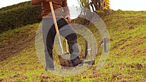 Man plants tree, working in the garden. Nature, environment and ecology concept.