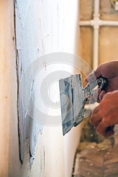 Man plastering wall