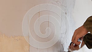 Man plastering wall