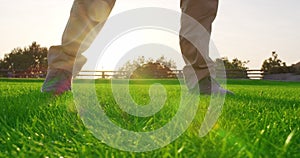 Man play Golfing And Putting Ball In Hole. Close-up.