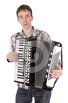 Man playing an accordion isolated over white