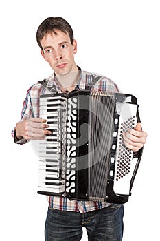 Man playing an accordion isolated over white