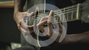 Man playing acoustic guitar