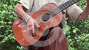 Man Playing Acoustic Guitar