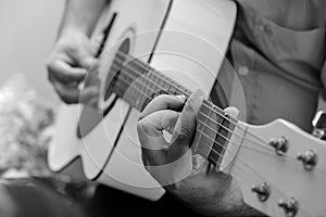 Man Playing Acoustic Guitar.