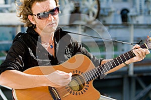 Man playing acoutic guitar