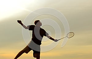 Man playing badminton