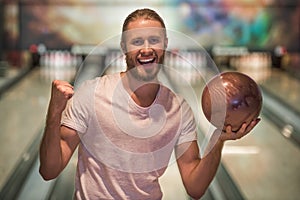 Man playing bowling