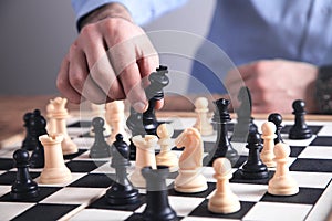 Man playing chess. Competition strategy concept