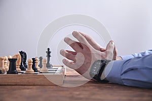 Man playing chess. Competition strategy concept