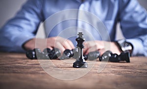 Man playing chess. Competition strategy concept